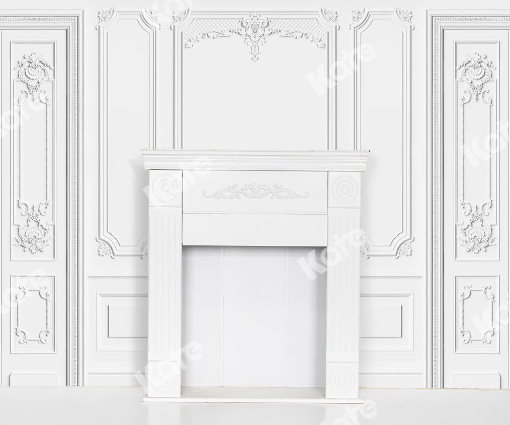 Kate白いヴィンテージ刻まれた壁の背景屋内暖炉Uta Mueller設計