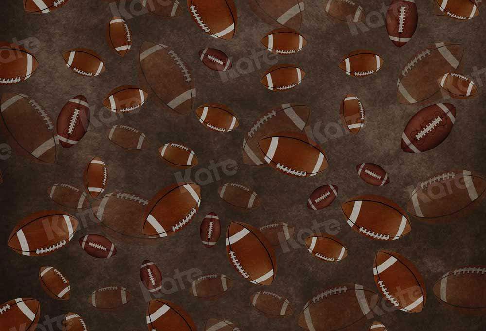 kate写真撮影のためにラグビーフットボールのケーキスマッシュの背景を繰り返す