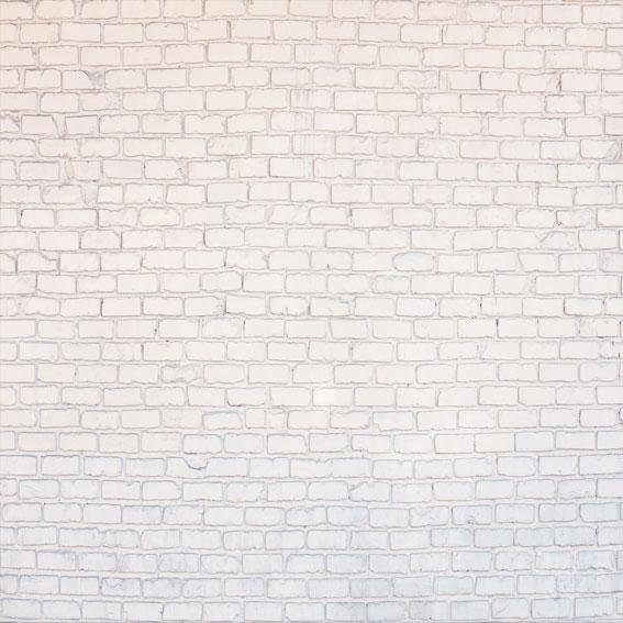 写真のkateレンガの古いレトロな白い壁の背景