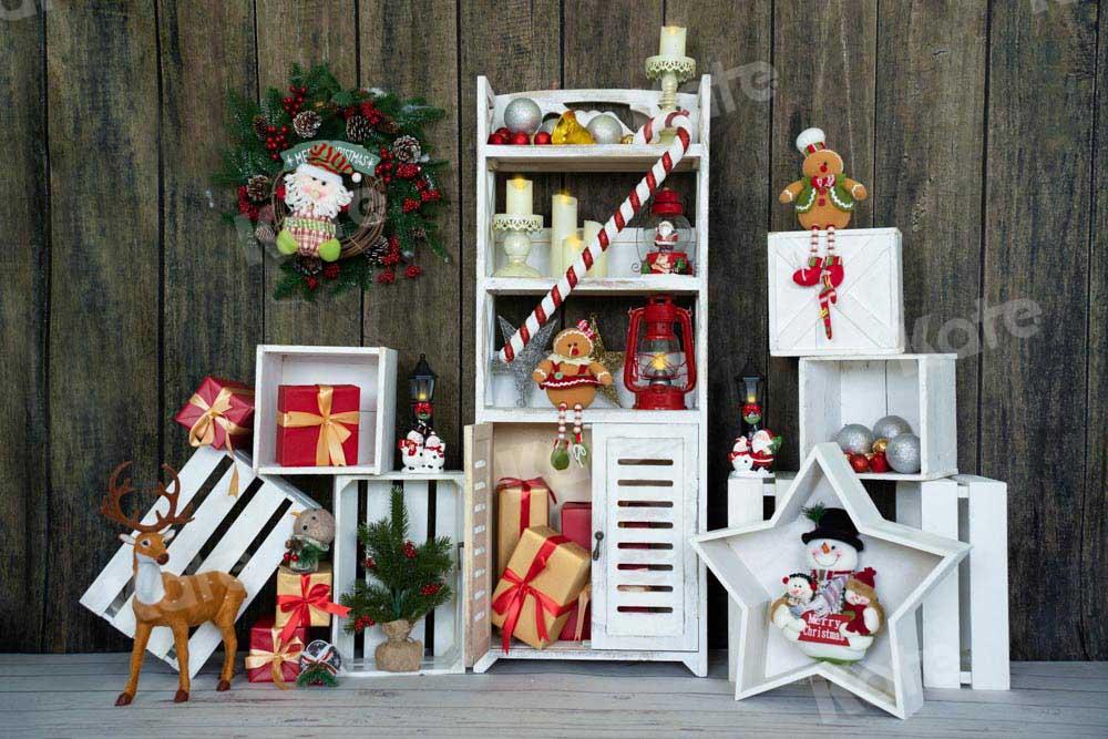kateクリスマスギフトの背景の花輪の棚
