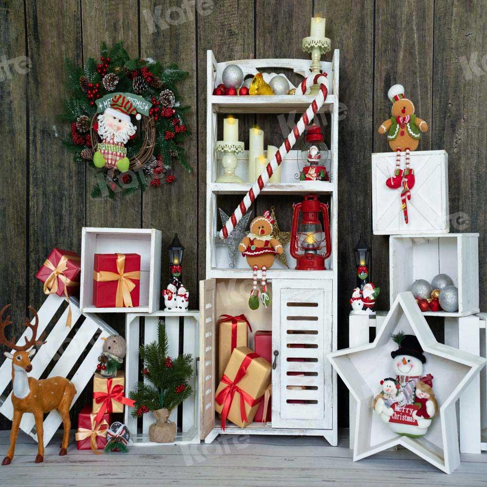 kateクリスマスギフトの背景の花輪の棚