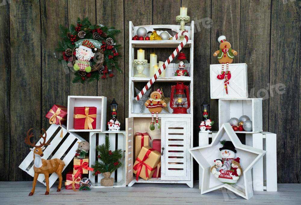 kateクリスマスギフトの背景の花輪の棚